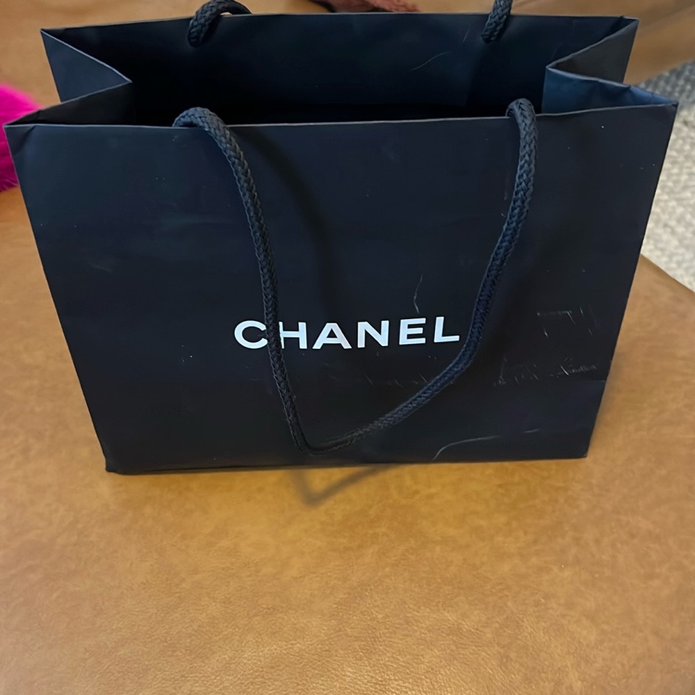 Chanel shopping bag. A little scuffed from a move.